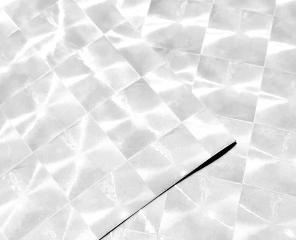 White marble-like pattern with 'Cat Eyes' specialist laminate branding.