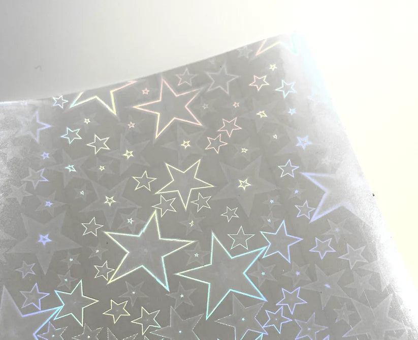 Hollywood holographic laminate with star pattern on a gray background
